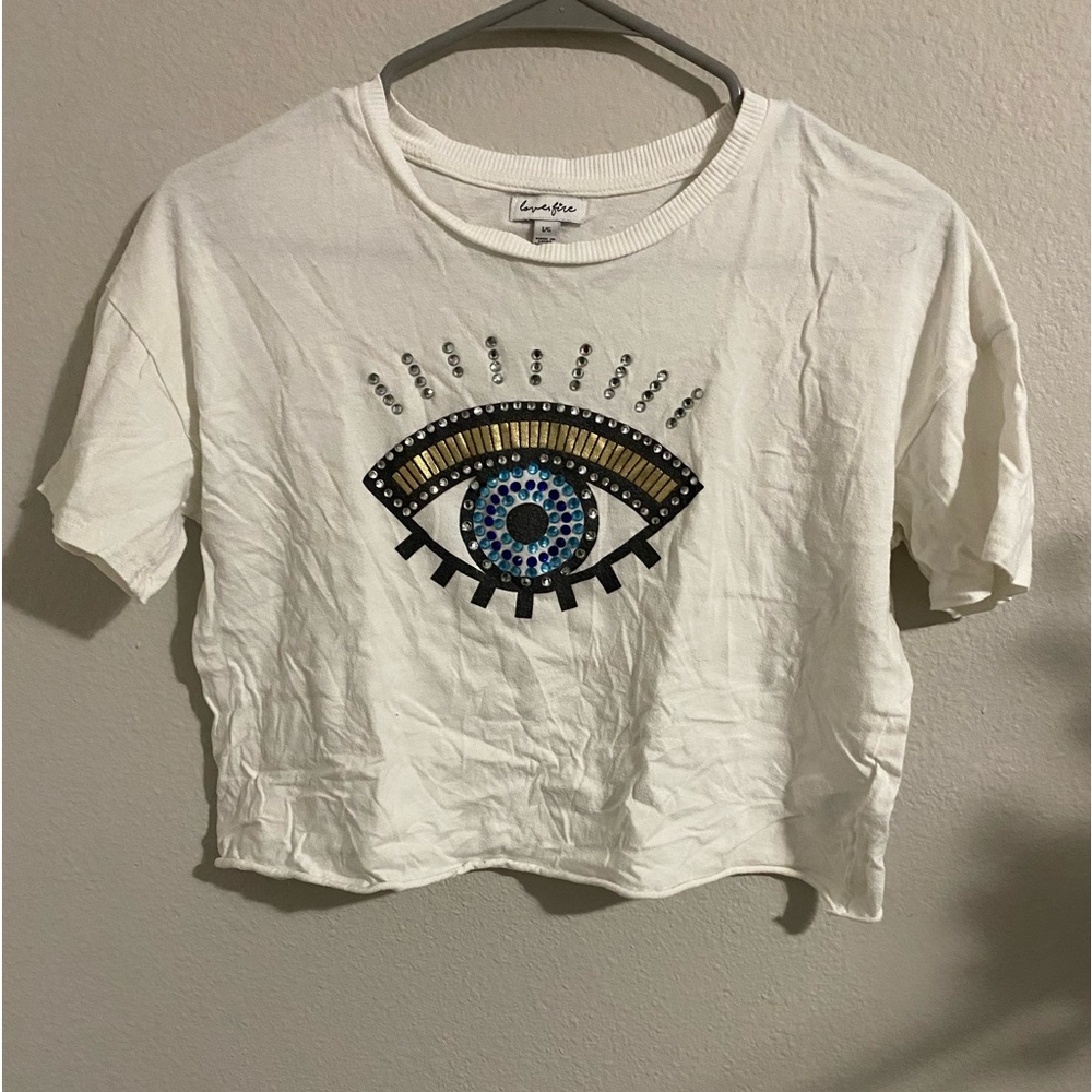 it’s a cropped evil eye shirt with gems